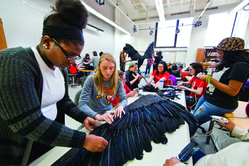 Students working on vulture sculptures as part of the exhibit